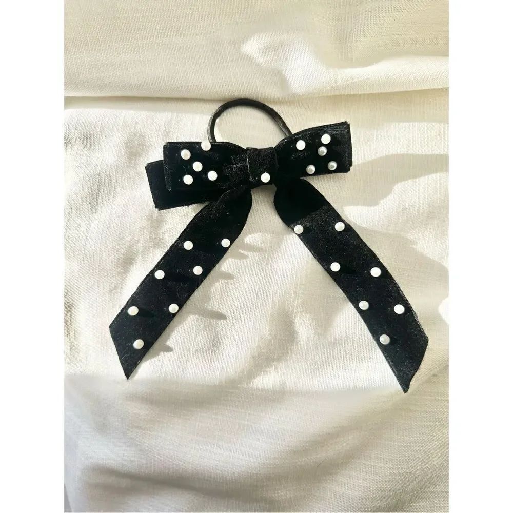 Black velvet bow hair tie with pearl embellishment